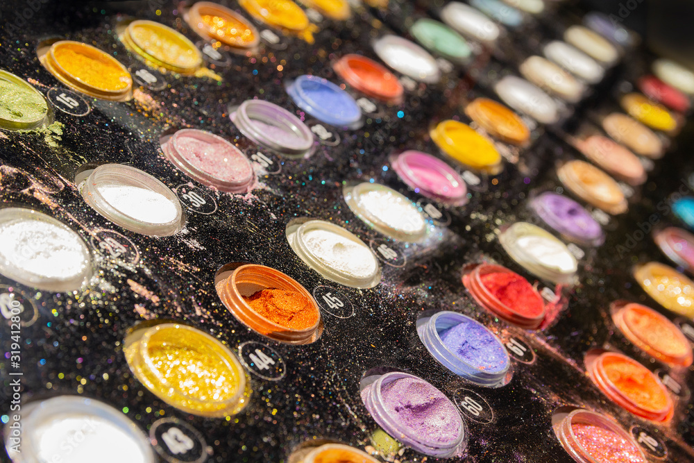 Makeup eye shadows on the counter close-up. Sale Makeup eye shadows on the counter close-up. Sale