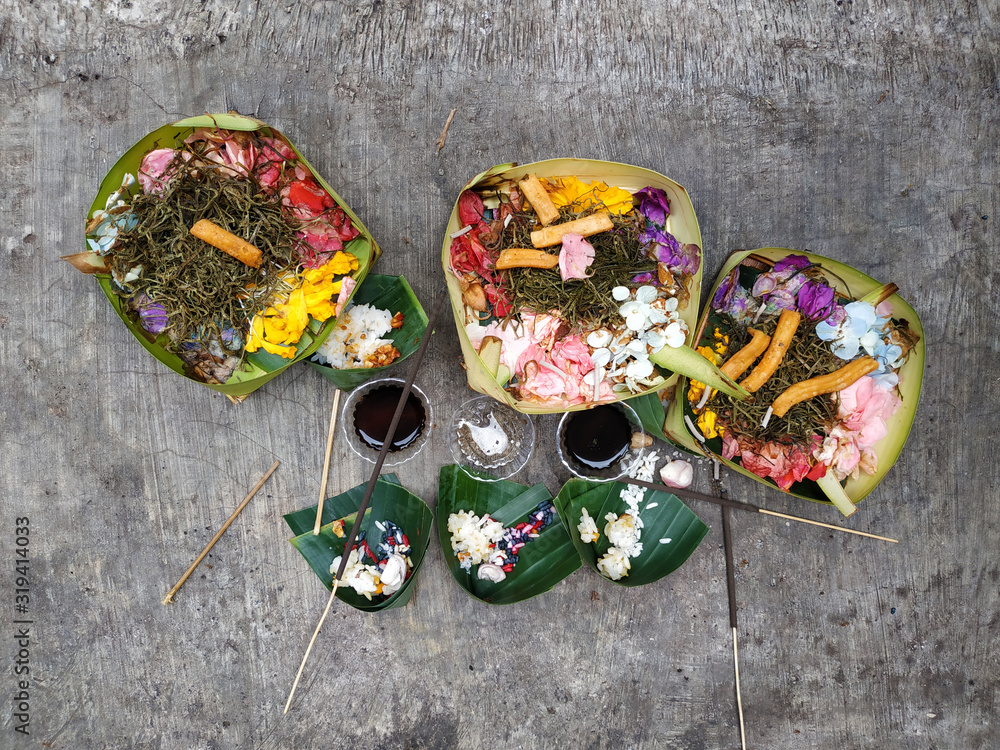 Offerings to the Hindu gods in front of the houses of Balinese residents