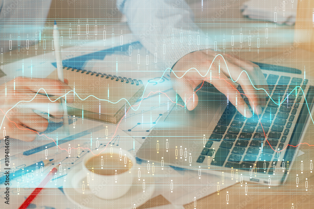 Forex graph with businessman working on computer in office on background. Concept of hardworking. Double exposure. Forex graph with businessman working on computer in office on background. Concept of hardworking. Double exposure.