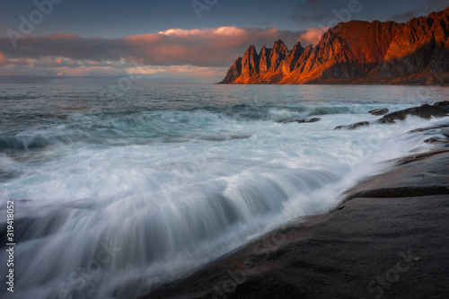 Autumn in Senja Island in Norway with beautiful light and colors. photo