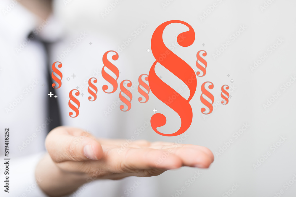 Fototapeta premium paragraph law sign digital in hand