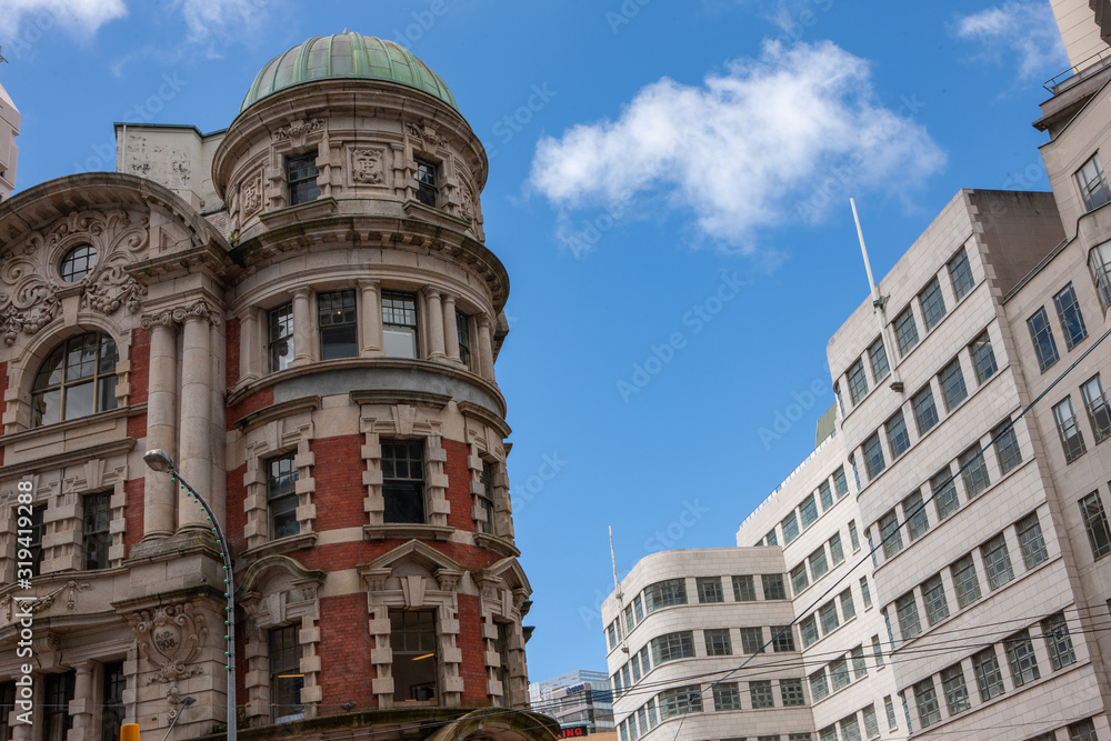 Wellington New Zealand. Old Victorian building in contrast with modern architecture buildings.