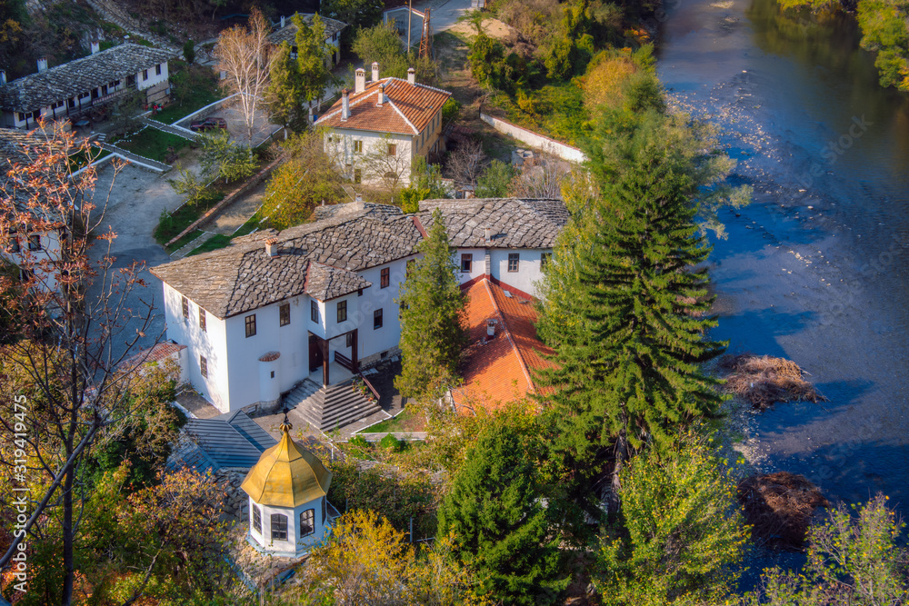 View of the Eastern Orthodox Cherepish Monastery “God’s mother Assumption” lies in the gorgeous Iskar defile on the banks of the Iskar River, Bulgaria. View of the Eastern Orthodox Cherepish Monastery “God’s mother Assumption” lies in the gorgeous Iskar defile on the banks of the Iskar River, Bulgaria.