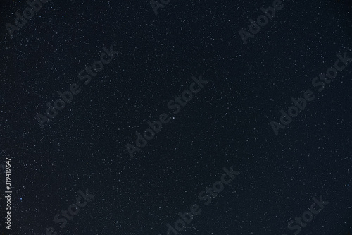 Starry sky at night. Polar star (Polaris) is in the middle of the frame