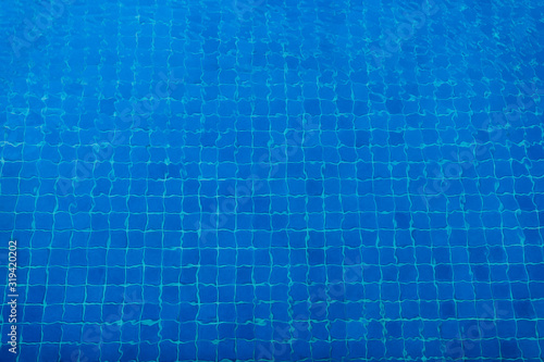 Swimming pool water waves surface background. Swimming pool water background texture. Abstract water ripples selective focus. element design. for graphic design banner and artwork
