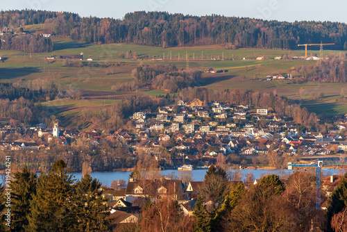 Maur city, view across the Greifensee lake photo