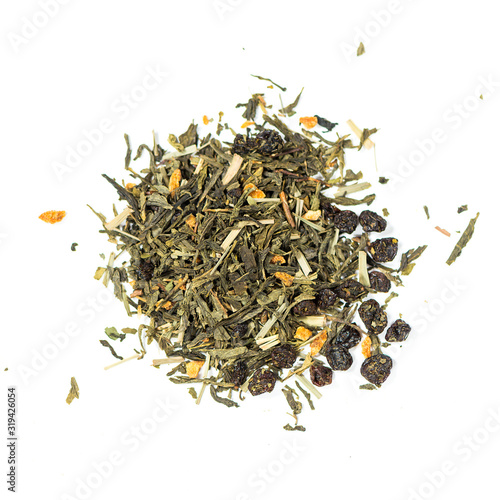 pile of natural whole leaf tea contains currants zest of green orange, mint, lemon grass and barberry 