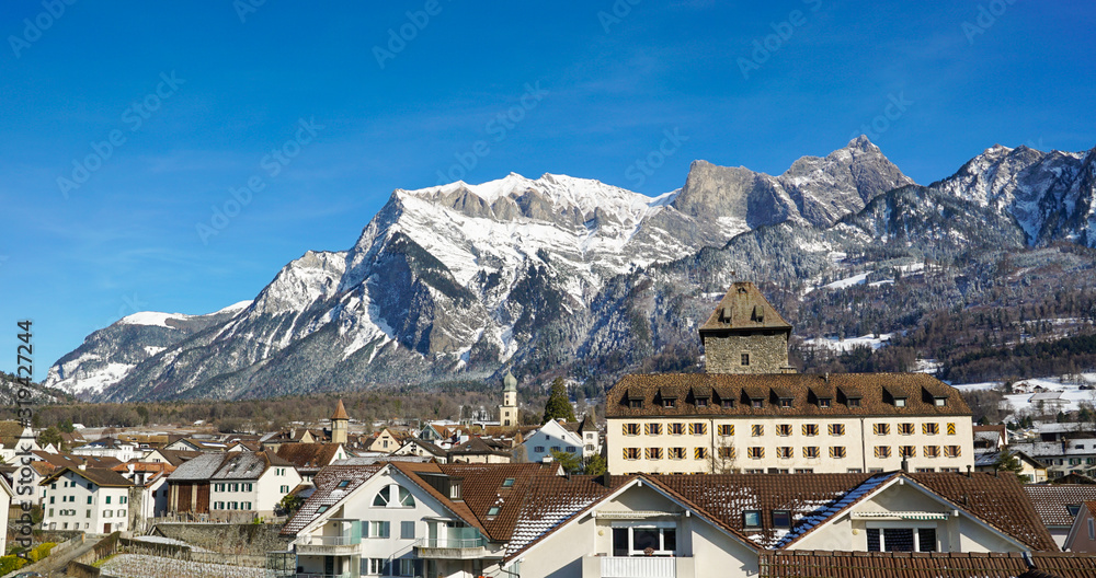winter mountain landscape view of idyllic historic city of Maienfeld in Switzerland