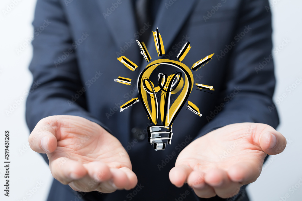 idea lamp concept in hand.