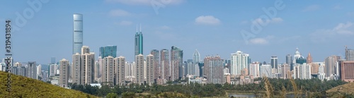 Panorama view of rural green fields in Hong Kong and skylines in Shenzhen,China