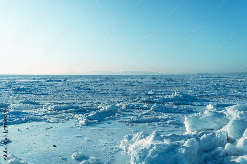 Ice blocks on the background of the frozen sea Ice blocks on the background of the frozen sea