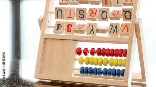  an alphabet abacus toy on bright, light background photo