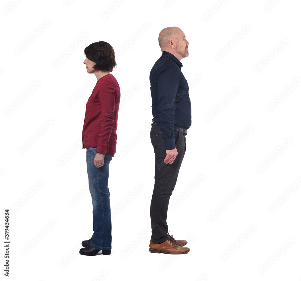 full portrait of a couple back to back on white full portrait of a couple back to back on white