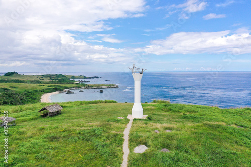 Lighthouse on a tropical island, top view. Basot Island, Caramoan, Camarines Sur, Philippines. photo