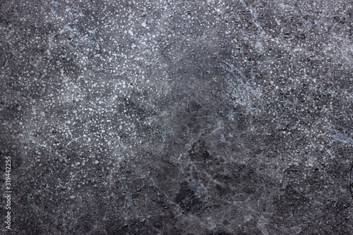 The texture of black stone, decorative background.