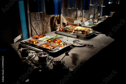 Various foods in brunch buffet in restaurant . photo