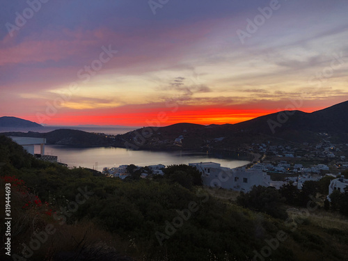 Sunset over Ios island bay and port