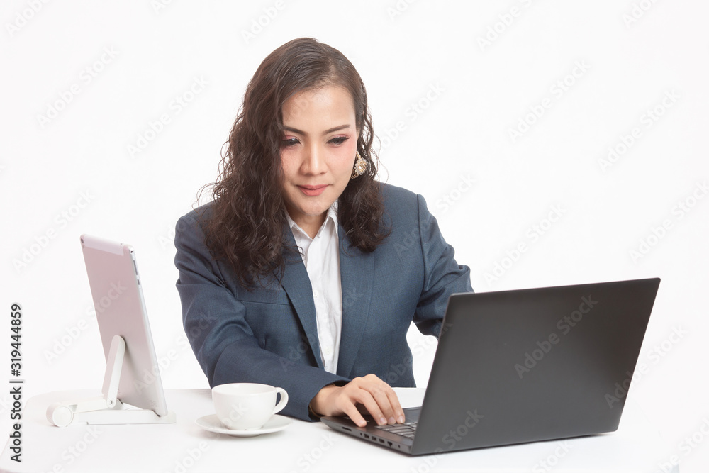 Beautiful young executive with her work and coffee Beautiful young executive with her work and coffee
