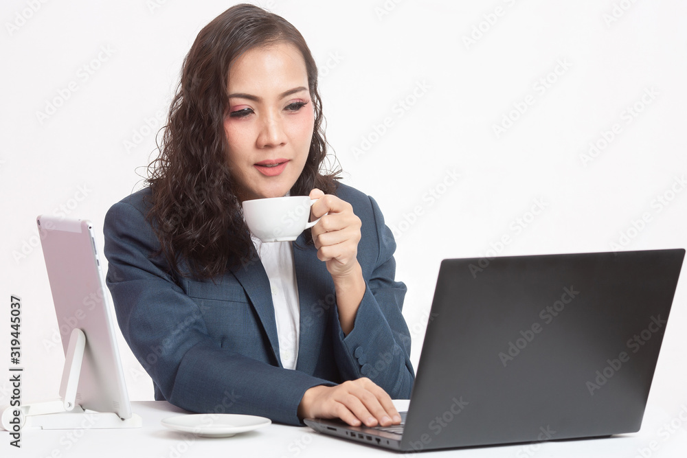 Beautiful young executive with her work and coffee Beautiful young executive with her work and coffee