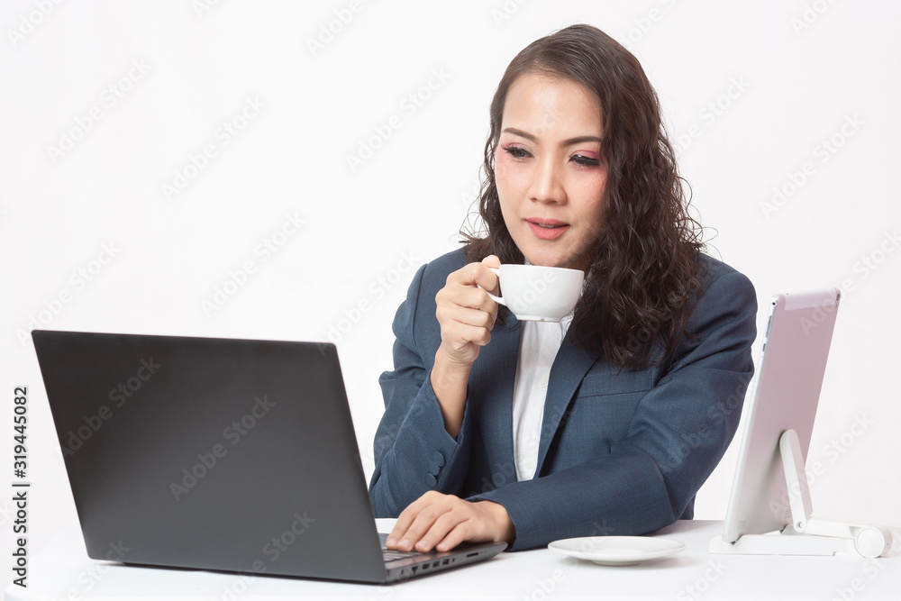 Beautiful young executive with her work and coffee Beautiful young executive with her work and coffee