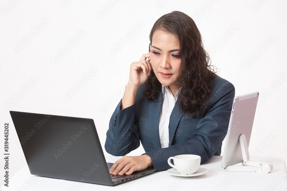 Beautiful young executive with her work and coffee Beautiful young executive with her work and coffee