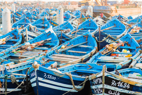fishing boats at sunset at the port in Essaouira, Morocco, North Africa © Despo