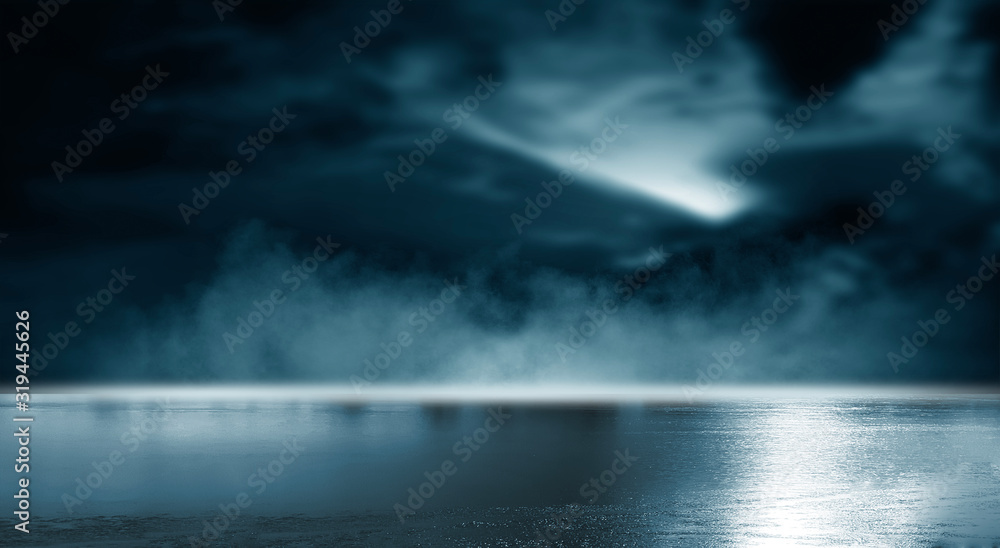 Futuristic empty night scene. Empty street scene background with abstract spotlights light. Night view of street light reflected on water. Rays through the fog. Smoke, fog, wet asphalt with reflection Futuristic empty night scene. Empty street scene background with abstract spotlights light. Night view of street light reflected on water. Rays through the fog. Smoke, fog, wet asphalt with reflection