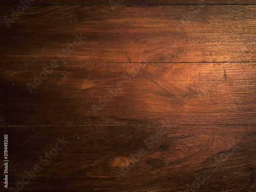 Closeup of walnut wood texture for background with copy space for design.