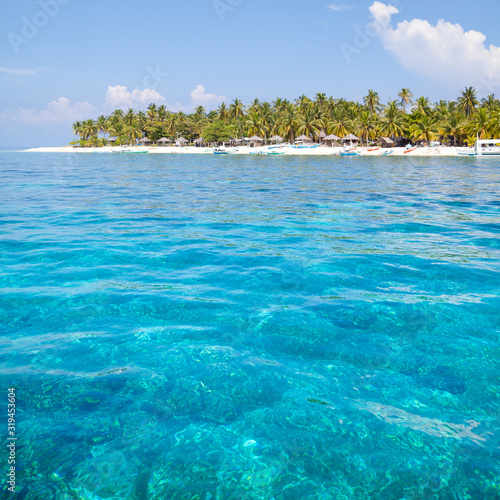 Turquoise lagoon and tropical island.