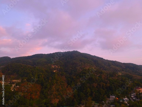 Panoramic Aerial View of Patong Mountains Phuket Thailand with the Sunset creating many beautiful colours