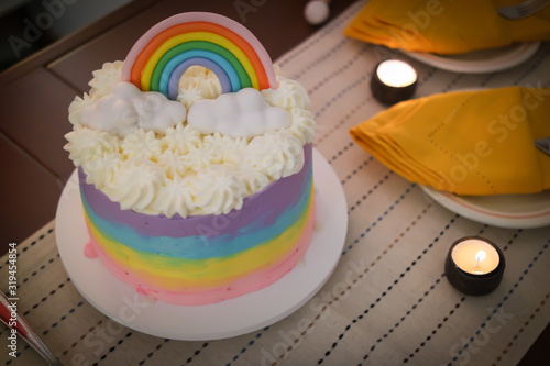 A beatiful rainbow gender reveal cake 