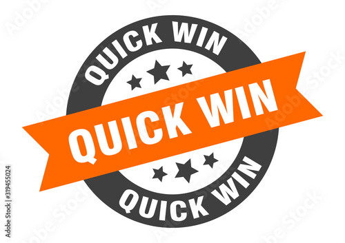 quick win sign. quick win round ribbon sticker. quick win tag