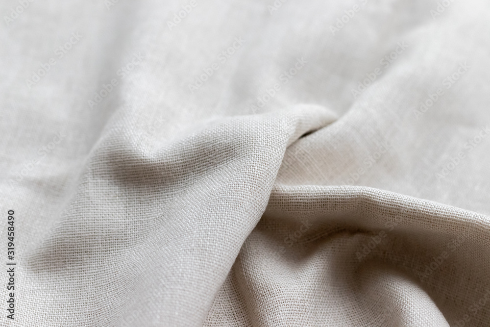Natural linen fabric texture. Rough crumpled burlap background. Selective focus. Closeup view - obrazy, fototapety, plakaty 