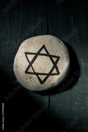 the star of david in a stone photo