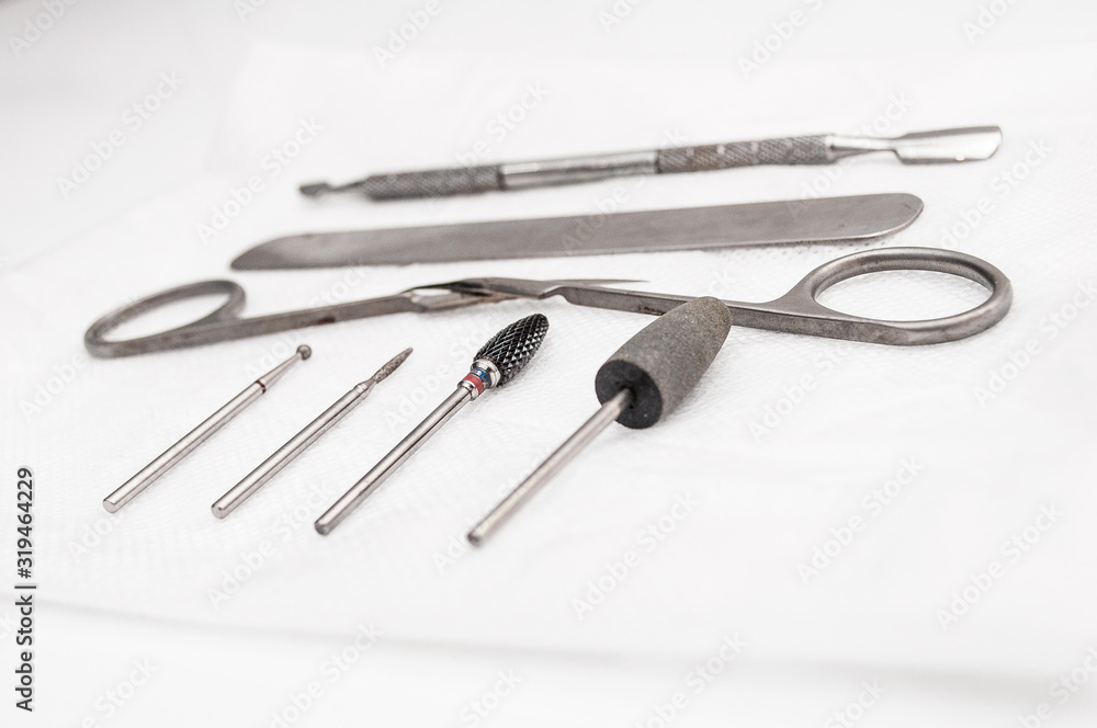 manicure tools are dried on a napkin after disinfection manicure tools are dried on a napkin after disinfection