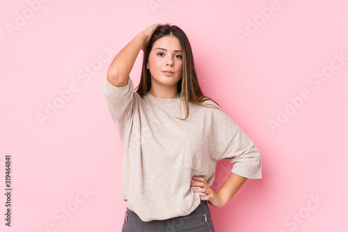 Young caucasian woman posing isolated tired and very sleepy keeping hand on head.