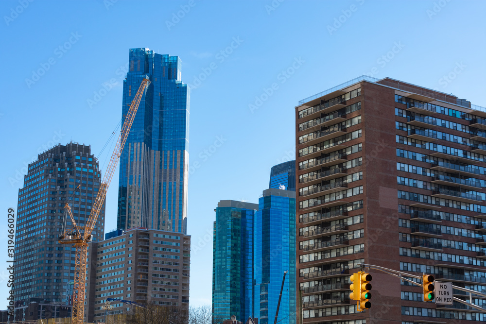 Downtown Jersey City with Modern Skyscrapers and Construction Downtown Jersey City with Modern Skyscrapers and Construction