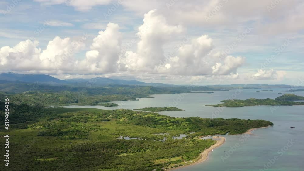 Seascape with islands in the early morning, aerial drone. Beautiful landscape on the island of Luzon. Caramoan Islands, Philippines. Summer and travel vacation concept. Seascape with islands in the early morning, aerial drone. Beautiful landscape on the island of Luzon. Caramoan Islands, Philippines. Summer and travel vacation concept.