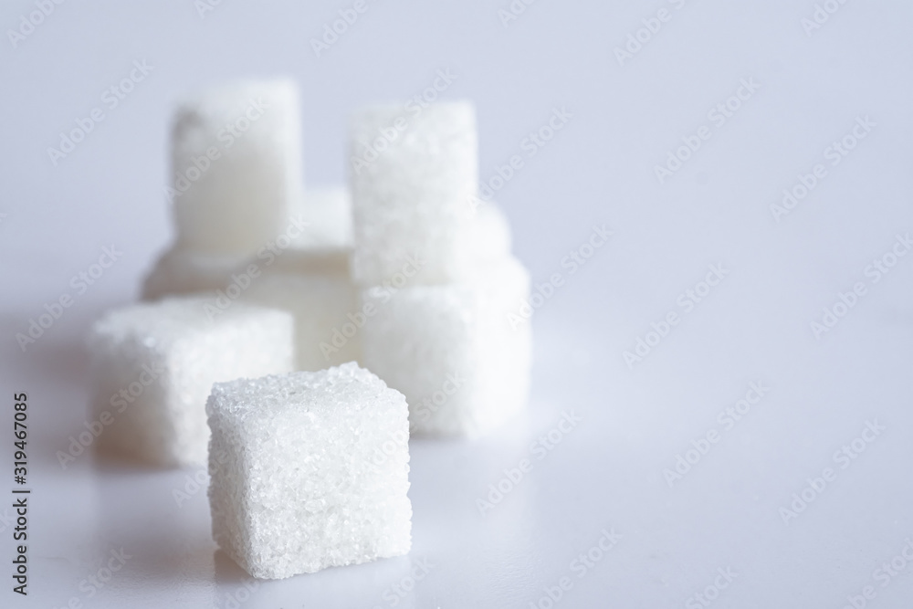 White sugar cube on white background. White sugar cube on white background.