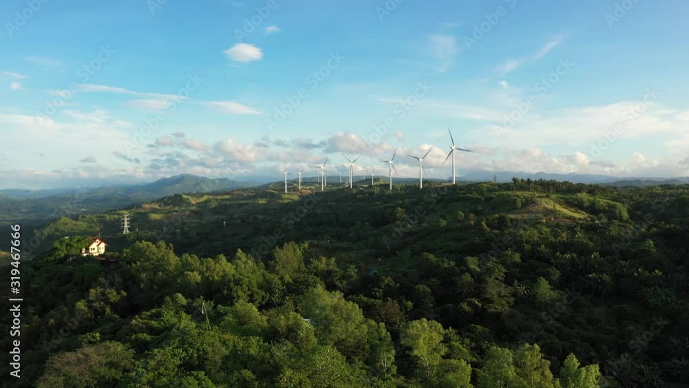 Aerial view of wind turbines and wind mills for electric power production in the Philippines, Luzon. Aerial view of wind turbines and wind mills for electric power production in the Philippines, Luzon.