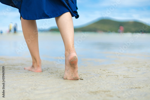 Happy Woman walking on the beach in summer vacation © Charnchai saeheng