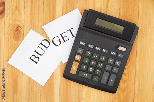 Cutting your monthly budget with a calculator and word budget cut