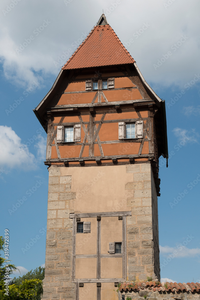 Dinkelsbühl, Germany - July 16, 2019; Historic tower called Bäuerlinsturm in Dinkelsbuehl a touristic and historic town on the romantic road