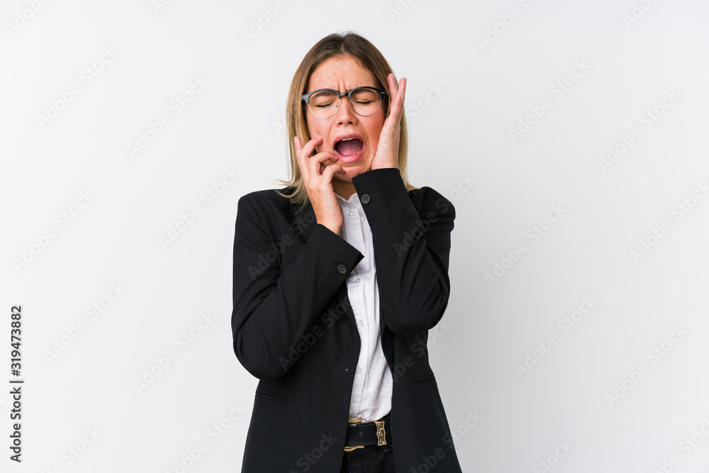 Young business caucasian woman whining and crying disconsolately. Young business caucasian woman whining and crying disconsolately.