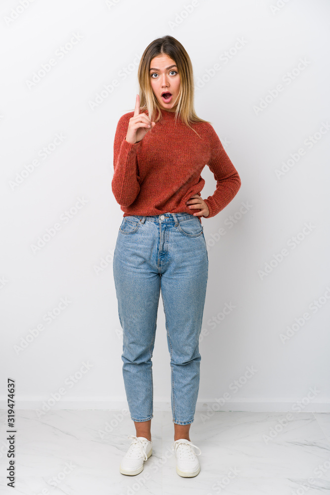 Full body young caucasian woman having an idea, inspiration concept. Full body young caucasian woman having an idea, inspiration concept.