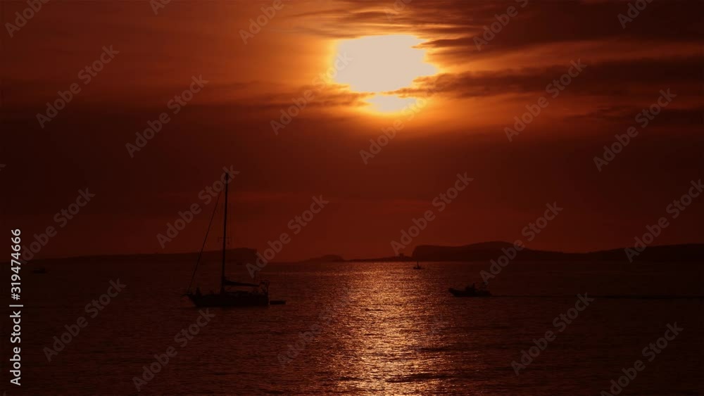 Sunset at the sea with a sailing ship Sunset at the sea with a sailing ship