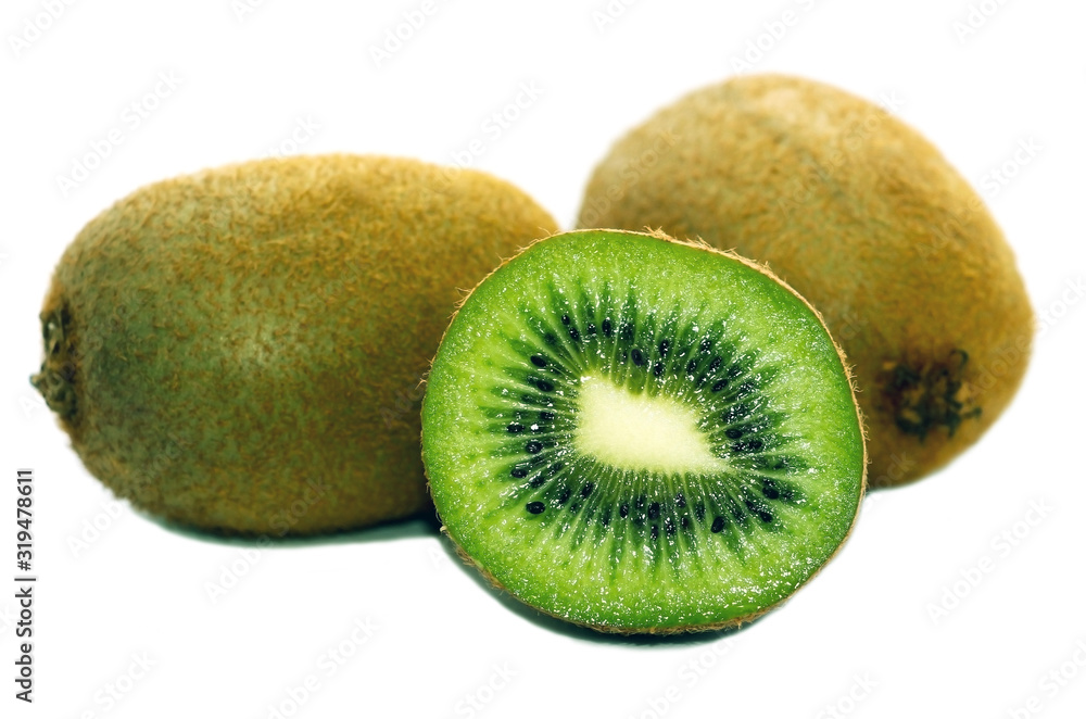 Natural juicy kiwi. Sweet and sour half of an exotic fruit of green color. Natural juicy kiwi. Sweet and sour half of an exotic fruit of green color.