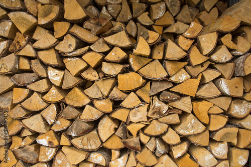 Stacks of Firewood. Preparation of firewood for the winter.