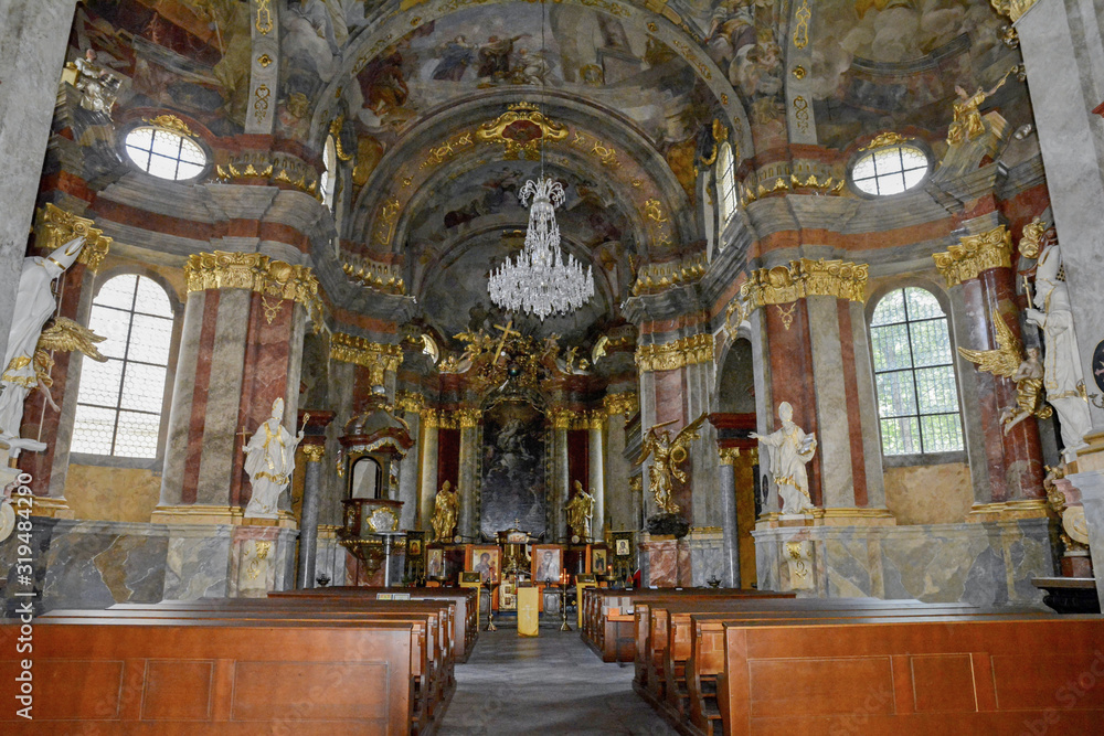 Obraz premium Church of St. Catherine of Alexandria in Prague. Church tower Catherine is visible from afar and looks like a thin minaret of a Muslim mosque. Frescoes inside the church.