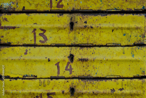 Old mailbox. Paint cracked from old age. Mailboxes of an apartment building.